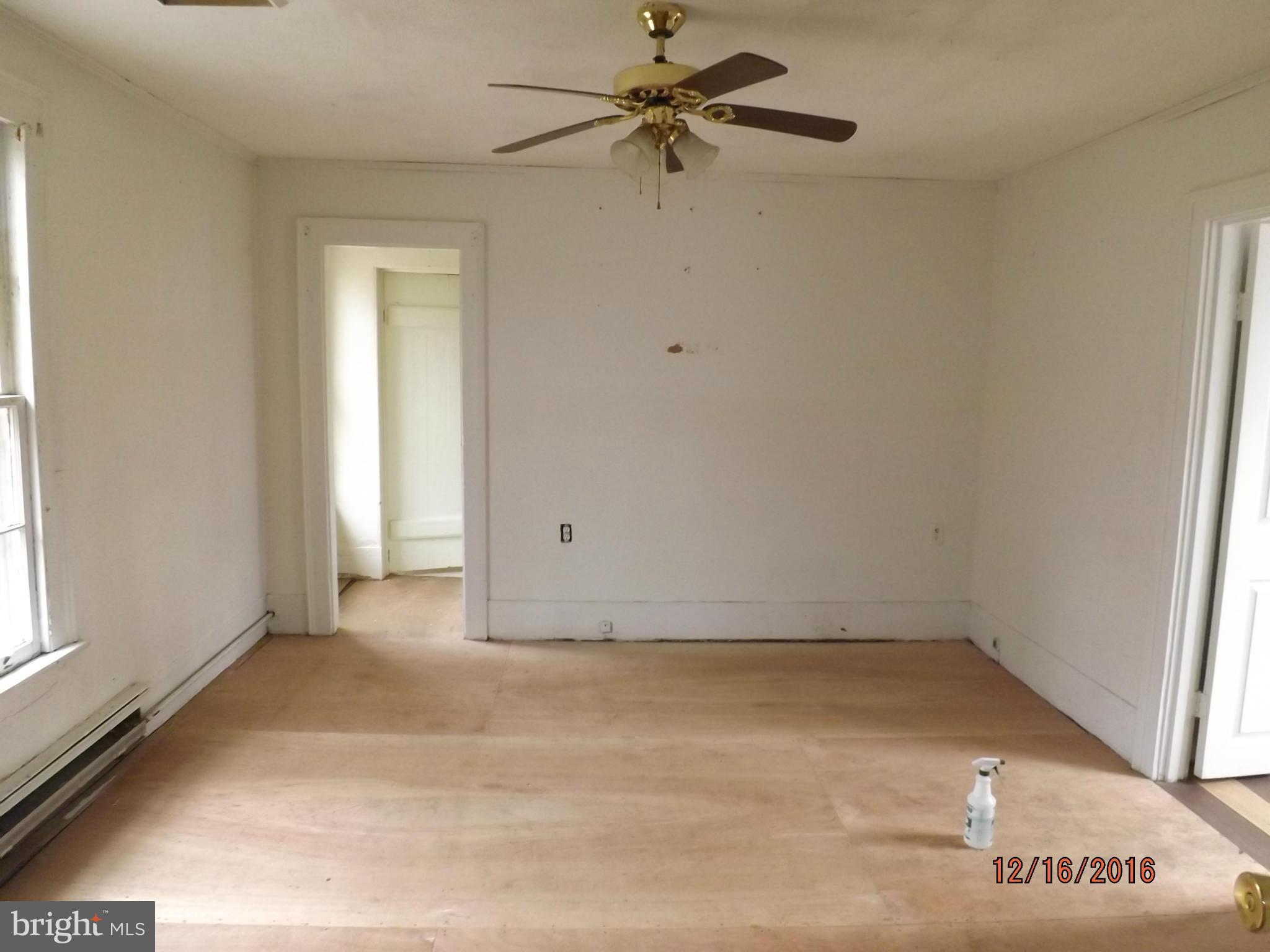 10 Big Spring Street Luray, VA 22835 - Photo 7 of 14 an empty room with a window