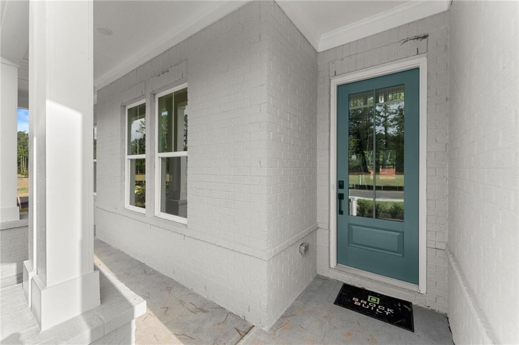 3552 Cedarvale Court Powder Springs, GA 30127 - Photo 3 of 46 a view of an entryway with a window