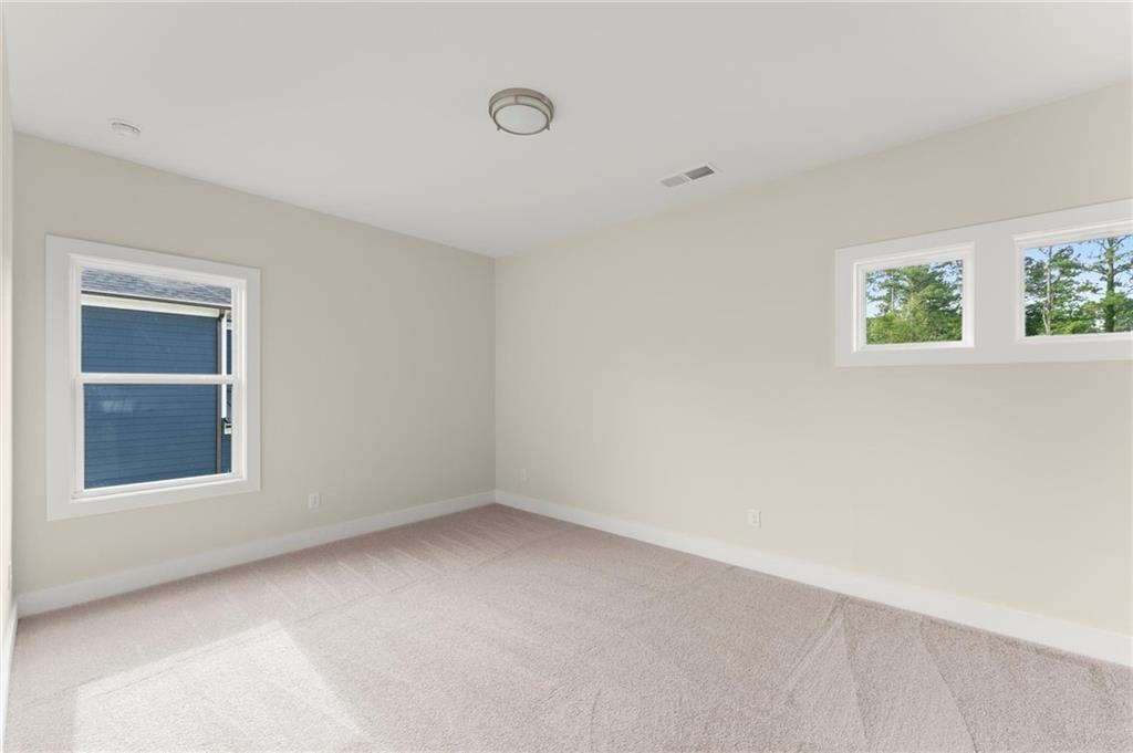 3552 Cedarvale Court Powder Springs, GA 30127 - Photo 35 of 46 a view of an empty room with a window