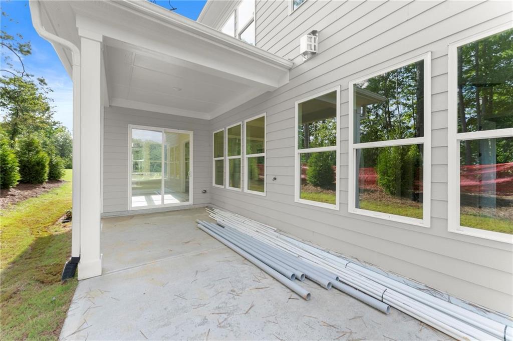 3552 Cedarvale Court Powder Springs, GA 30127 - Photo 45 of 46 a view of an empty room with a window and balcony view