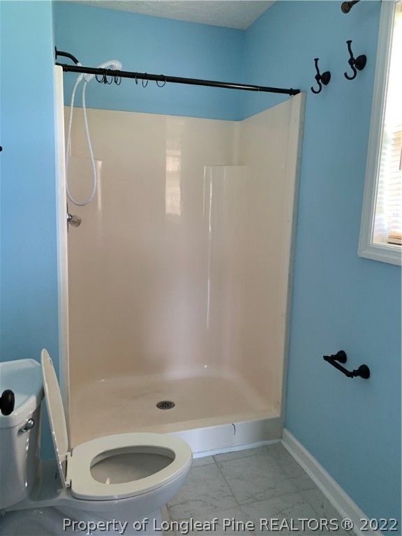 145 Rye Lane Raeford, NC 28376 - Photo 34 of 42 a bathroom with a shower