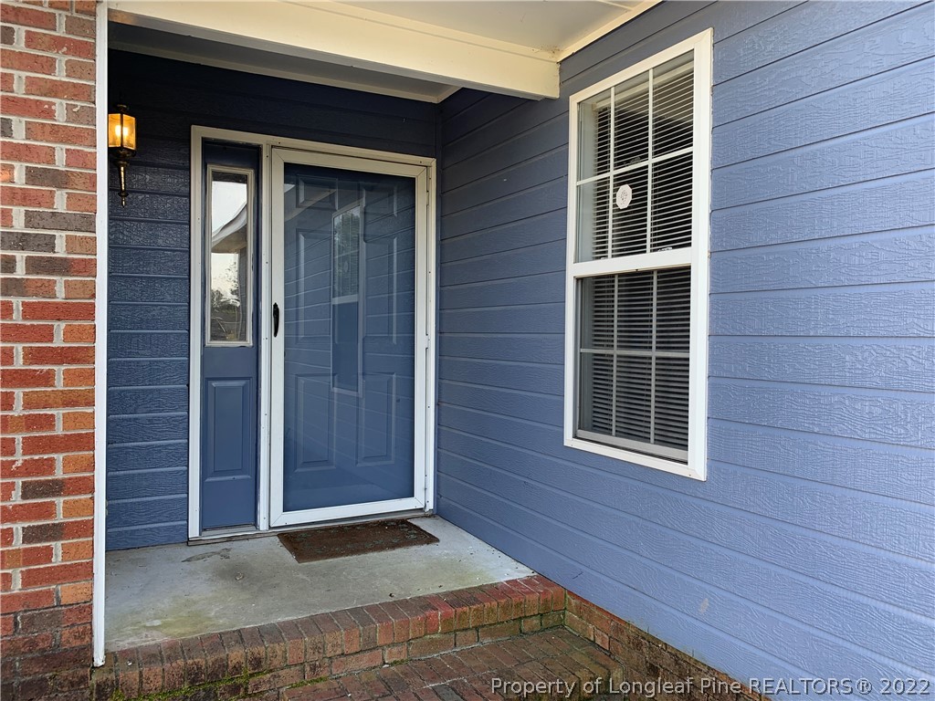 145 Rye Lane Raeford, NC 28376 - Photo 6 of 42 a view of front door of house