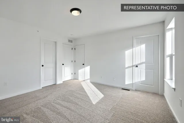 an empty room with windows