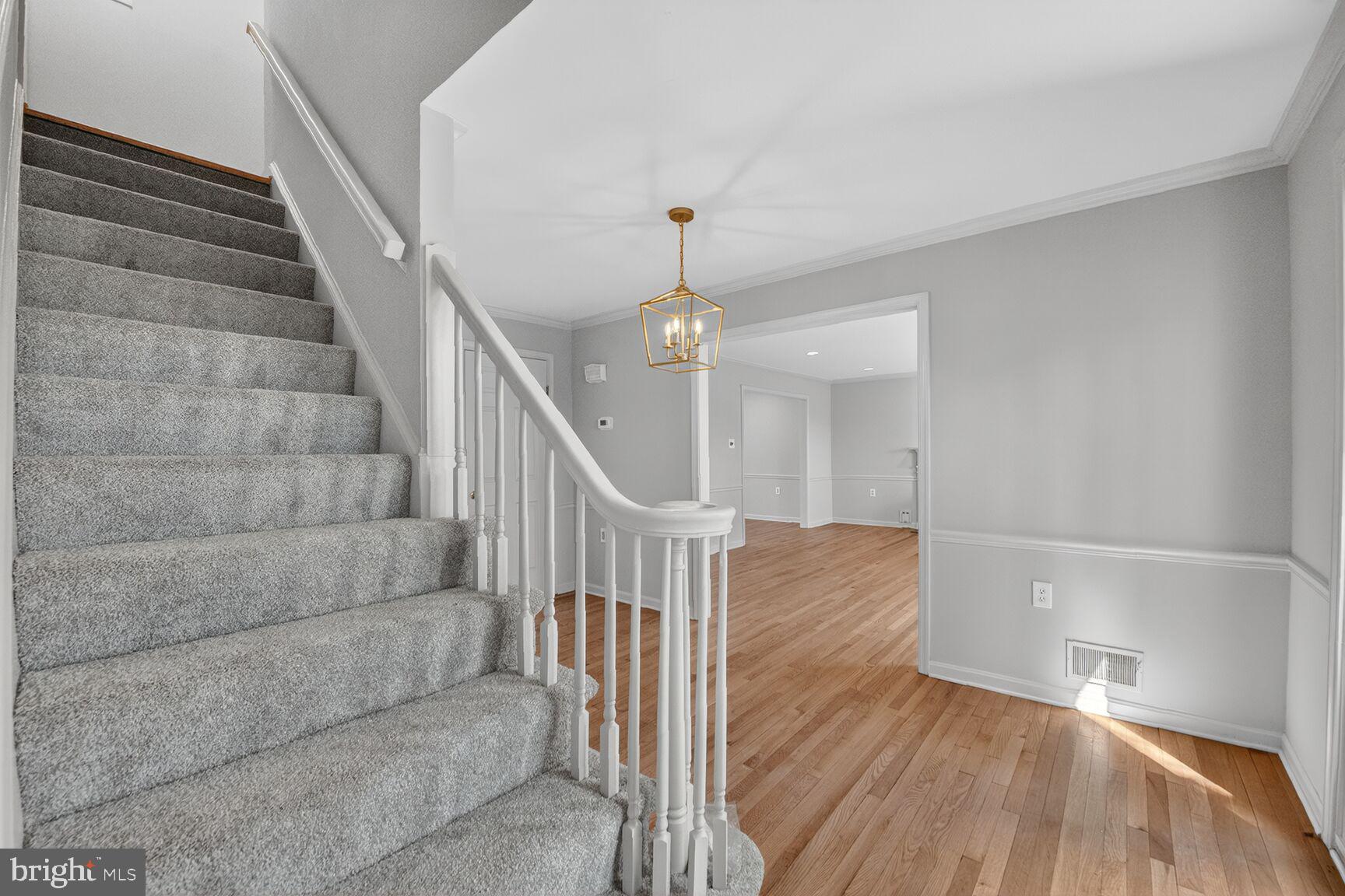 21733 Oatlands Road Aldie, VA 20105 - Photo 18 of 50 a view of entryway and hall with wooden floor