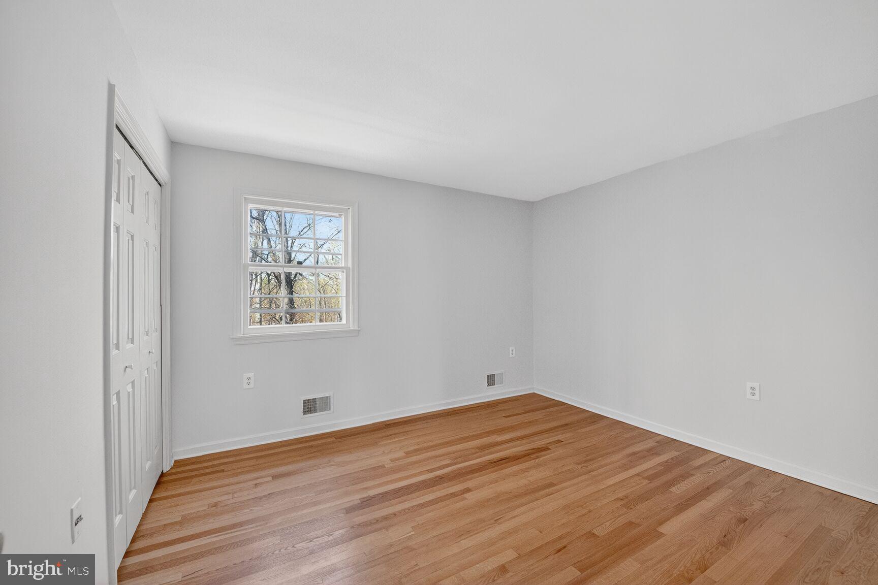 21733 Oatlands Road Aldie, VA 20105 - Photo 20 of 50 a view of empty room with wooden floor