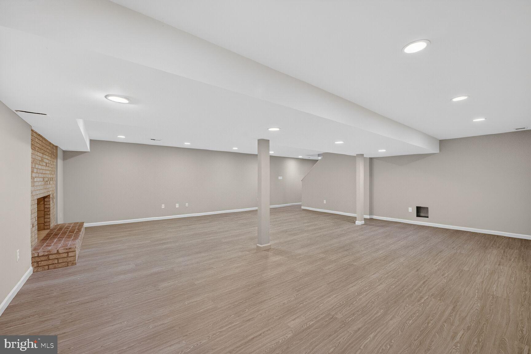 21733 Oatlands Road Aldie, VA 20105 - Photo 35 of 50 a view of an empty room with wooden floor