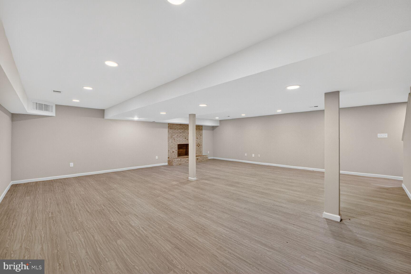 21733 Oatlands Road Aldie, VA 20105 - Photo 36 of 50 a view of an empty room with wooden floor