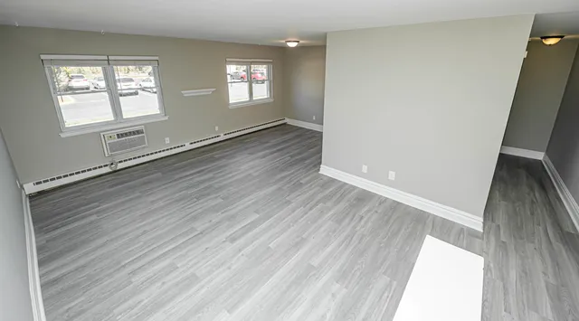 an empty room with windows