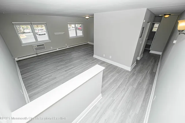 a view of an empty room and window