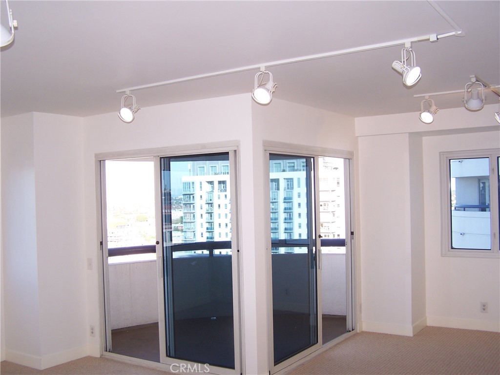 525 East Seaside Way, Unit 1601 Long Beach, CA 90802 - Photo 14 of 60 a view of a room with large windows