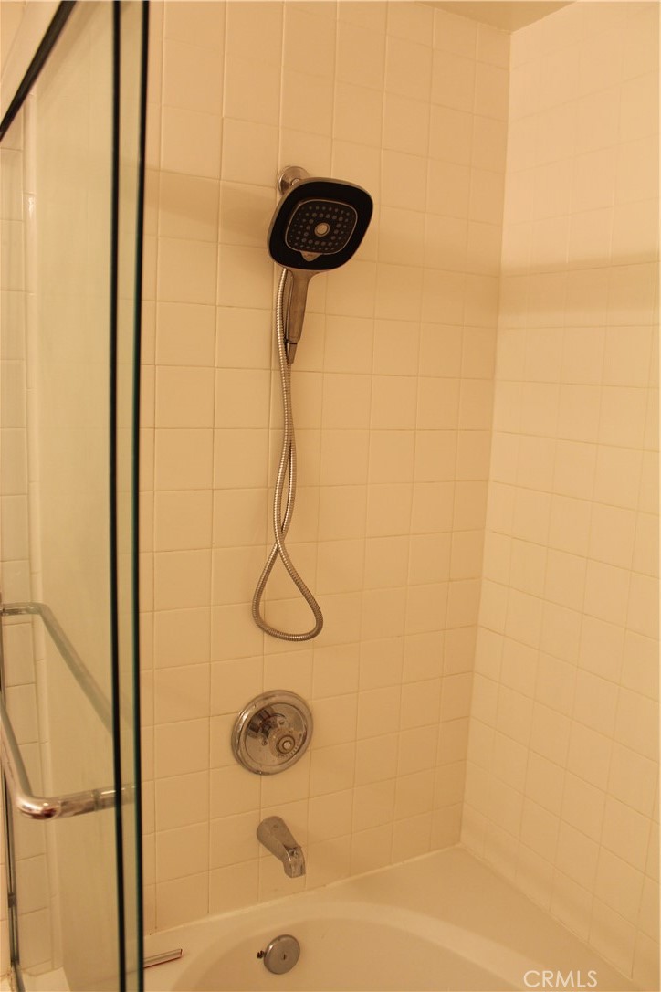 525 East Seaside Way, Unit 1601 Long Beach, CA 90802 - Photo 38 of 60 a bathroom with a shower