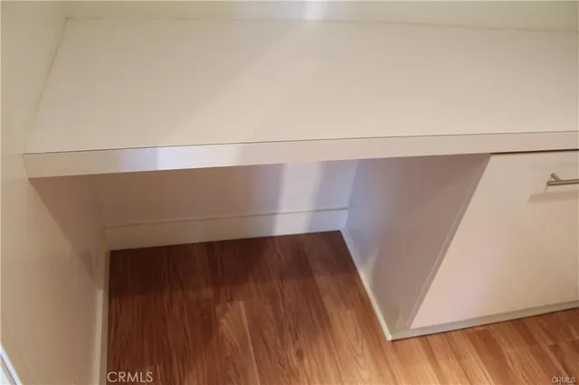 a living room with furniture and flat screen tv