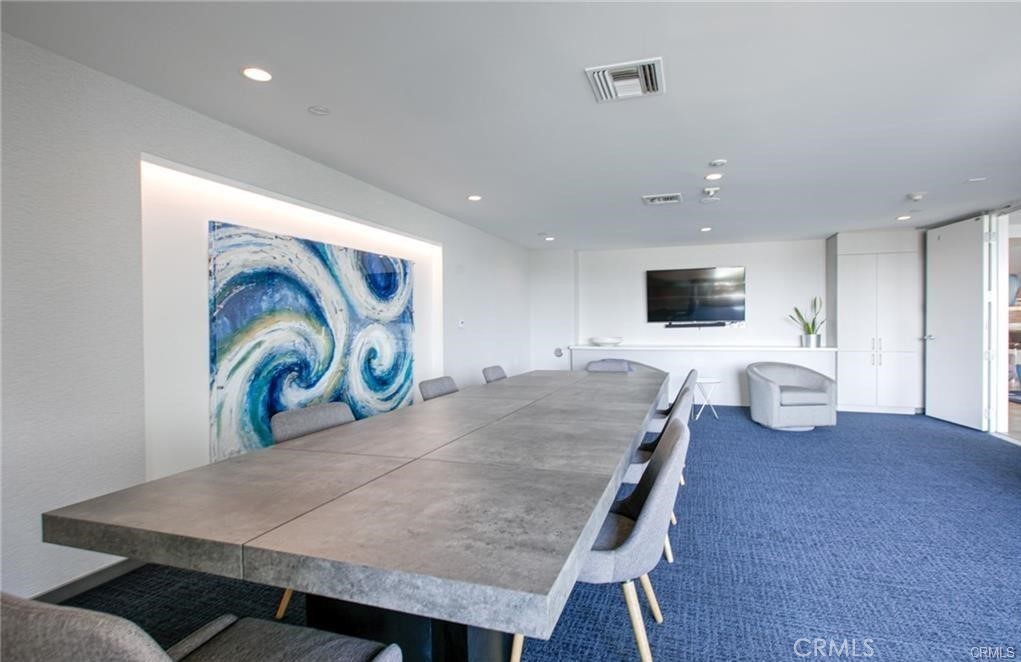 525 East Seaside Way, Unit 1601 Long Beach, CA 90802 - Photo 57 of 60 a living room with furniture and flat screen tv