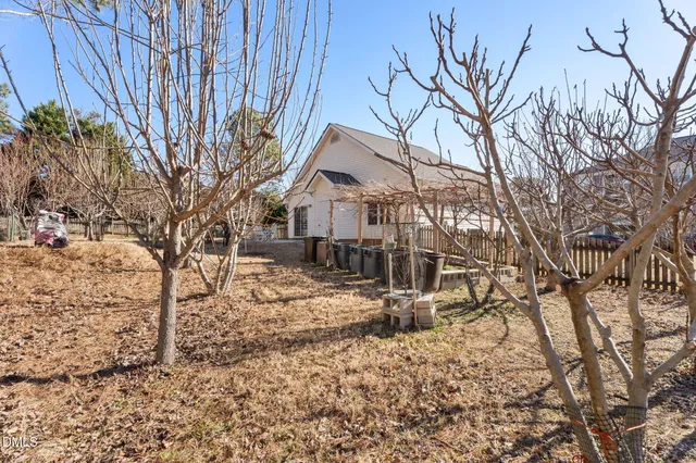 a view of a house with snow on the background
