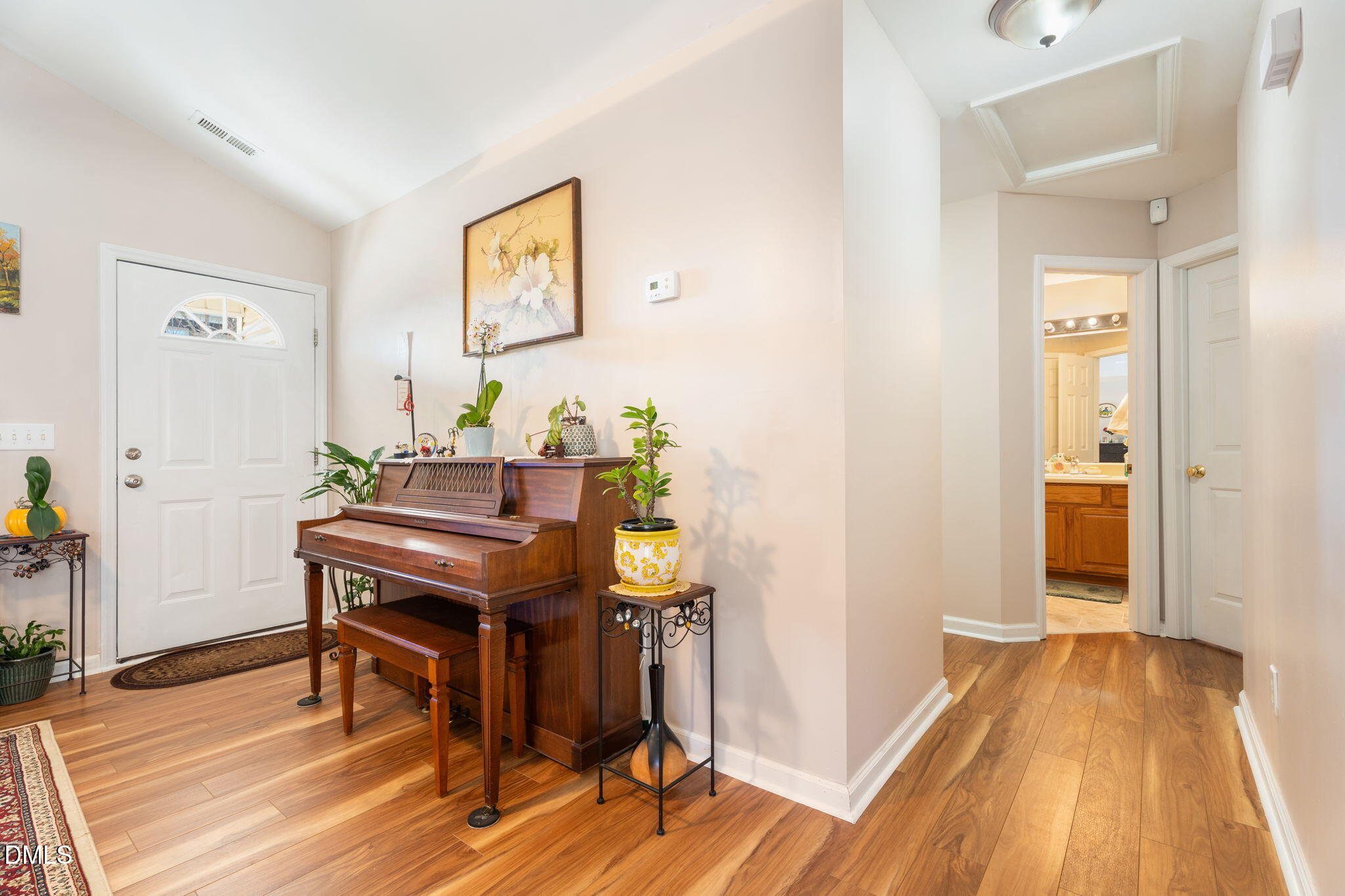 657 Flaherty Avenue Wake Forest, NC 27587 - Photo 9 of 25 a view of a room with furniture and wooden floor