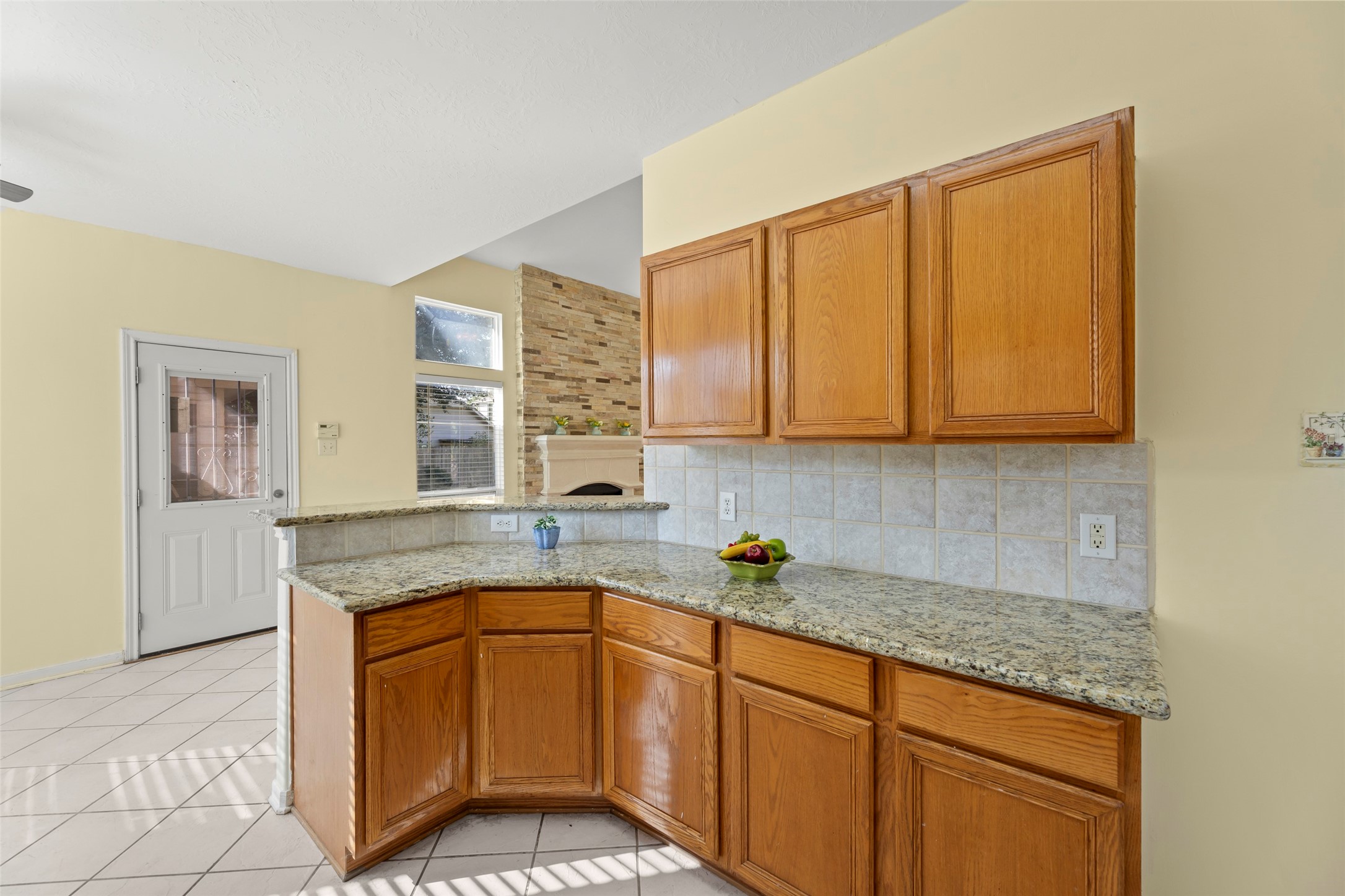 14715 Rancho Vista Drive Houston, TX 77083 - Photo 14 of 38 a kitchen with stainless steel appliances granite countertop a sink and cabinets