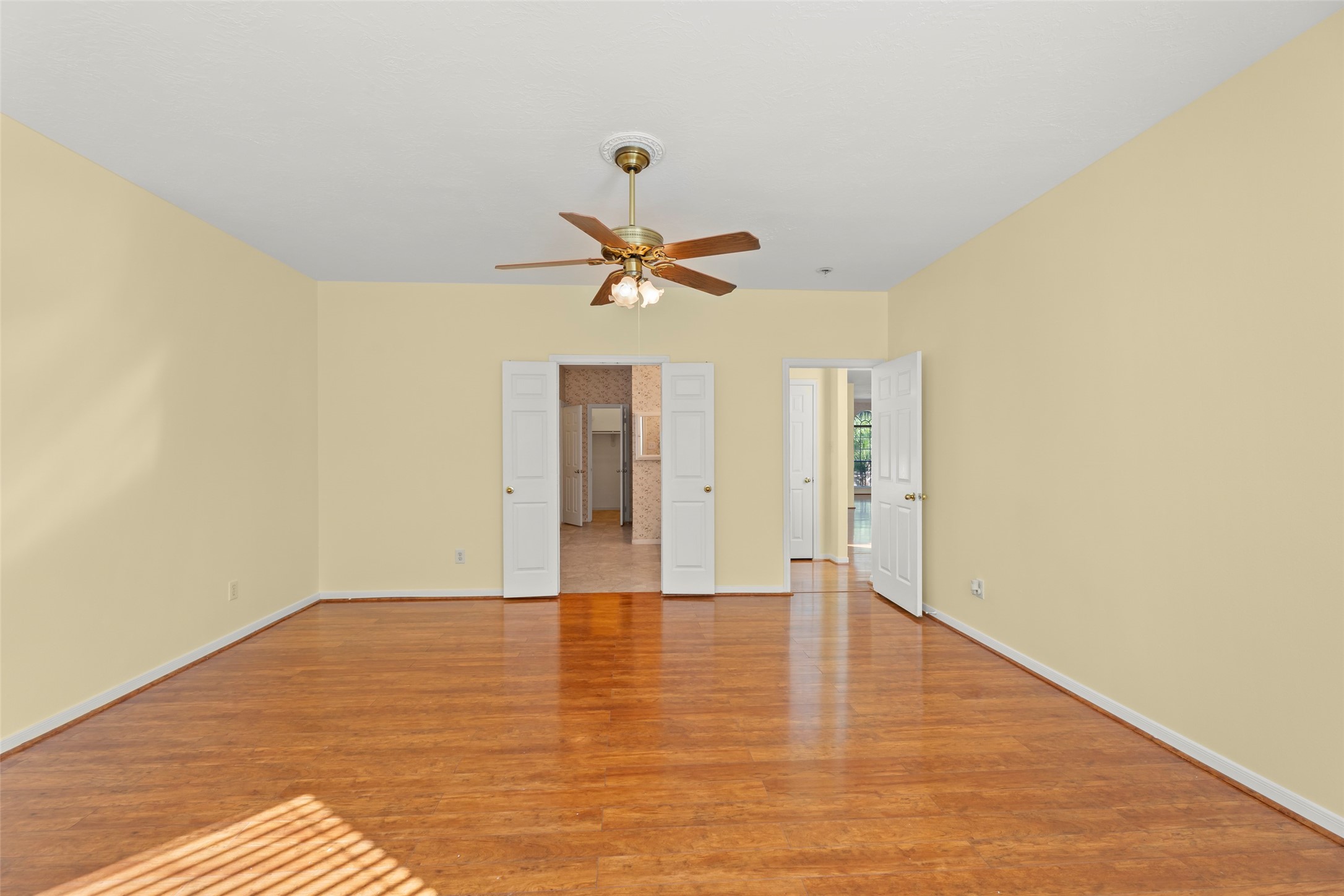 14715 Rancho Vista Drive Houston, TX 77083 - Photo 16 of 38 a view of an empty room with wooden floor