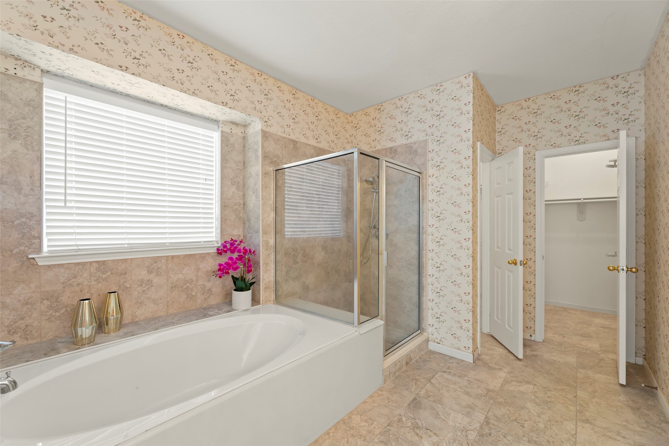 14715 Rancho Vista Drive Houston, TX 77083 - Photo 19 of 38 a bathroom with a bathtub and shower