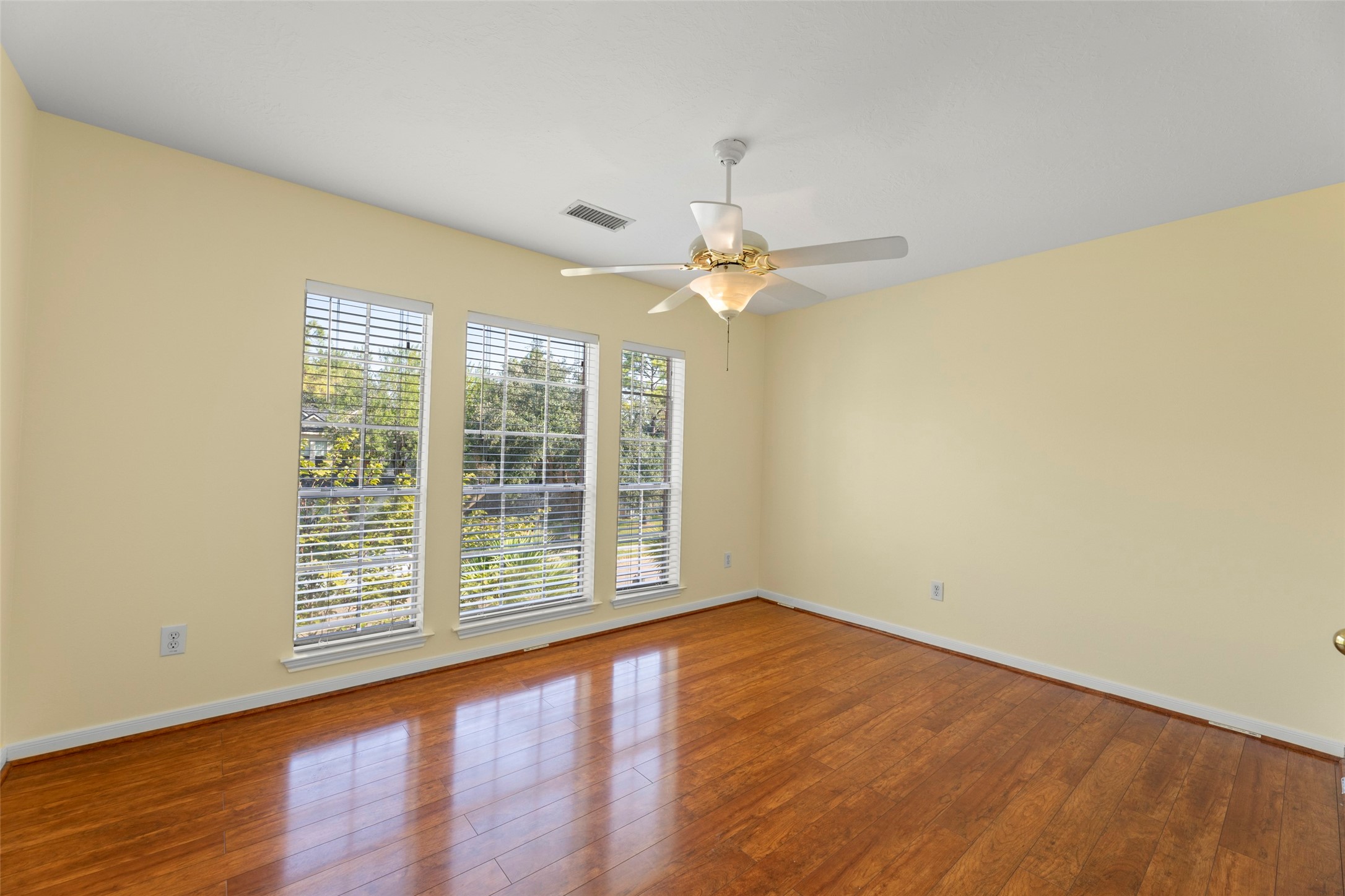 14715 Rancho Vista Drive Houston, TX 77083 - Photo 28 of 38 a view of an empty room with wooden floor and a window