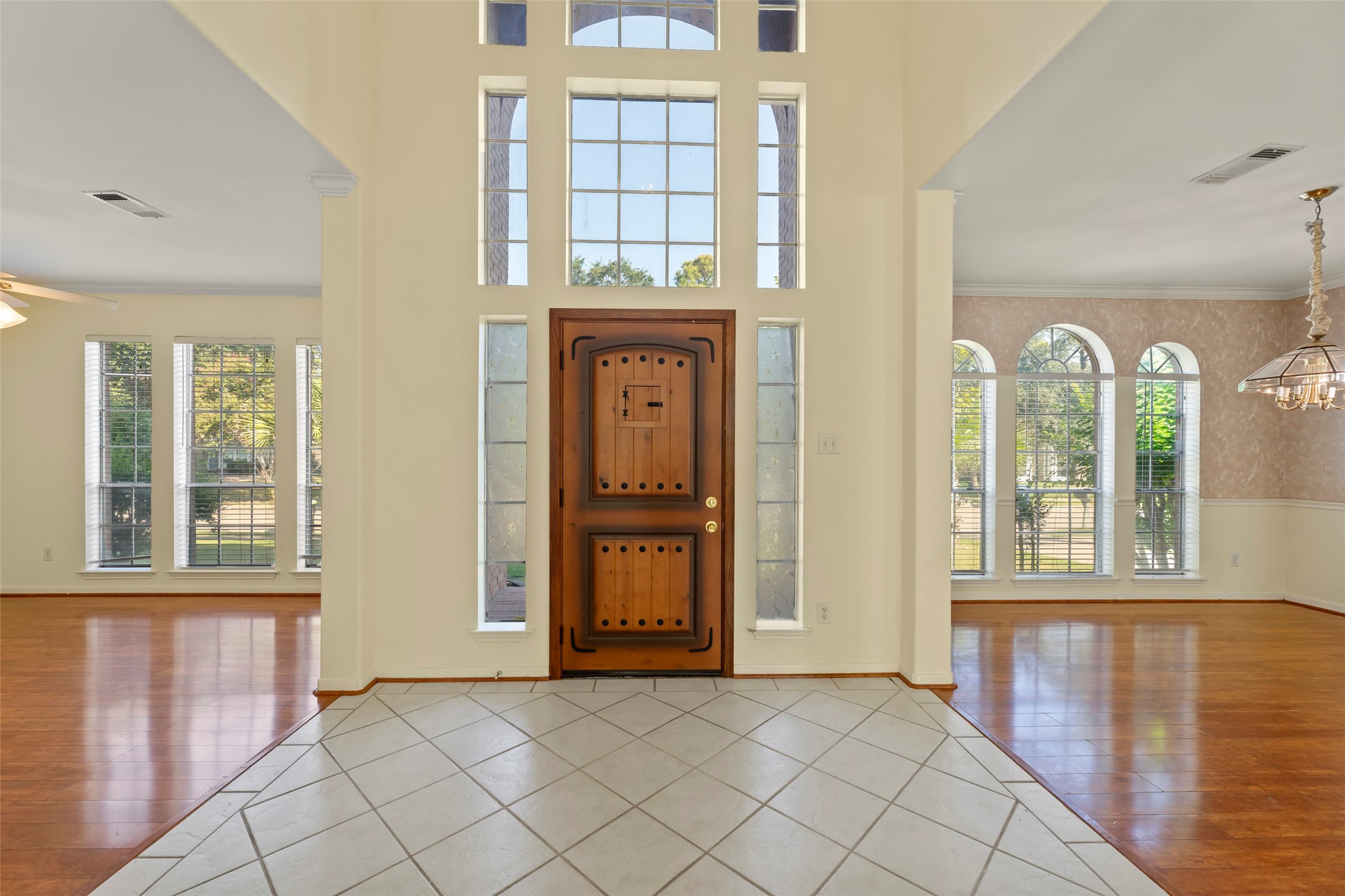 14715 Rancho Vista Drive Houston, TX 77083 - Photo 3 of 38 wooden floor in an empty room with a window