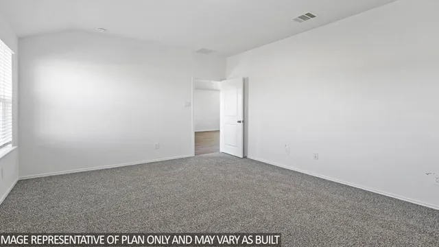 an empty room with an entryway