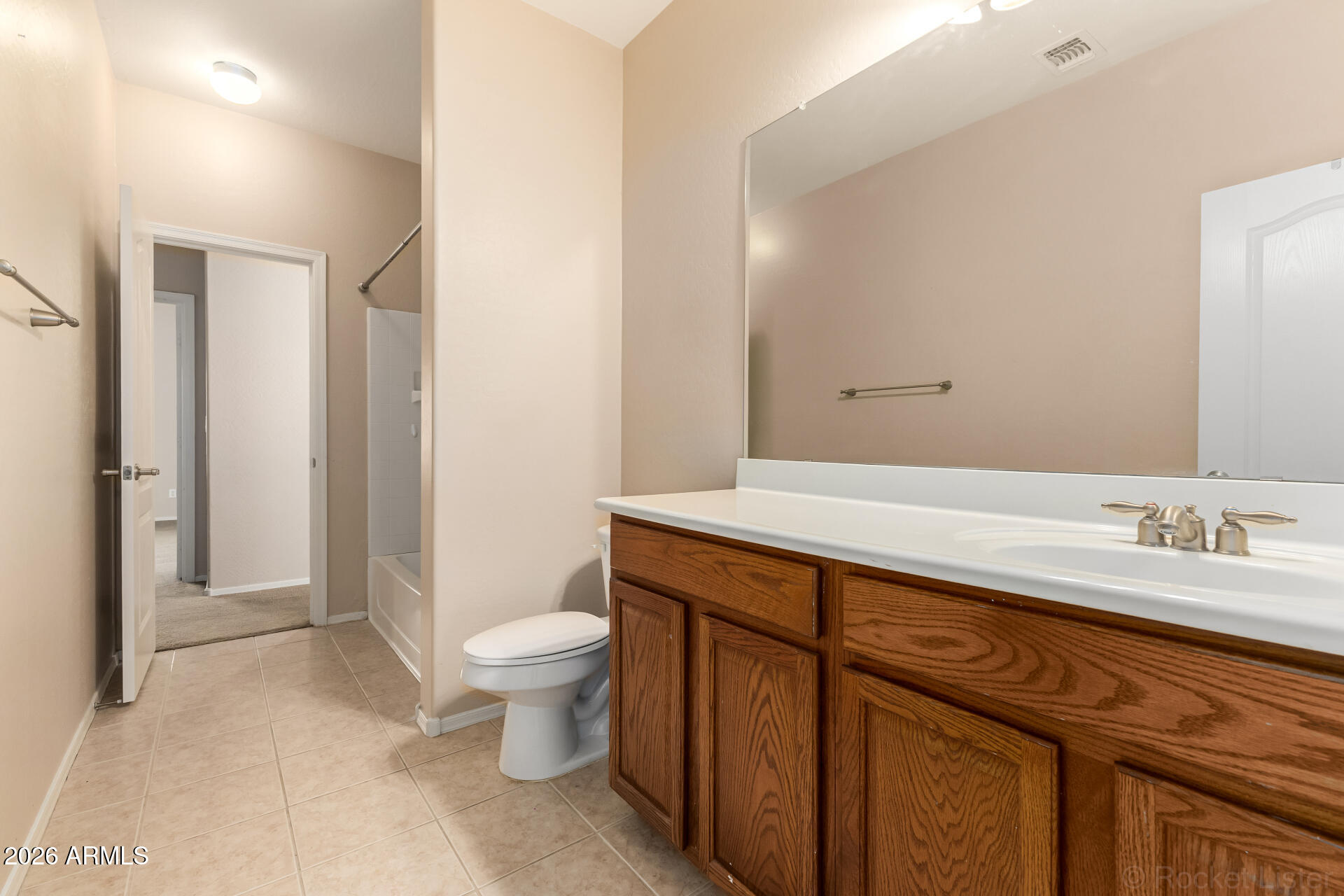 28314 North Crimm Road San Tan Valley, AZ 85143 - Photo 21 of 31 a bathroom with a sink a toilet a mirror and shower