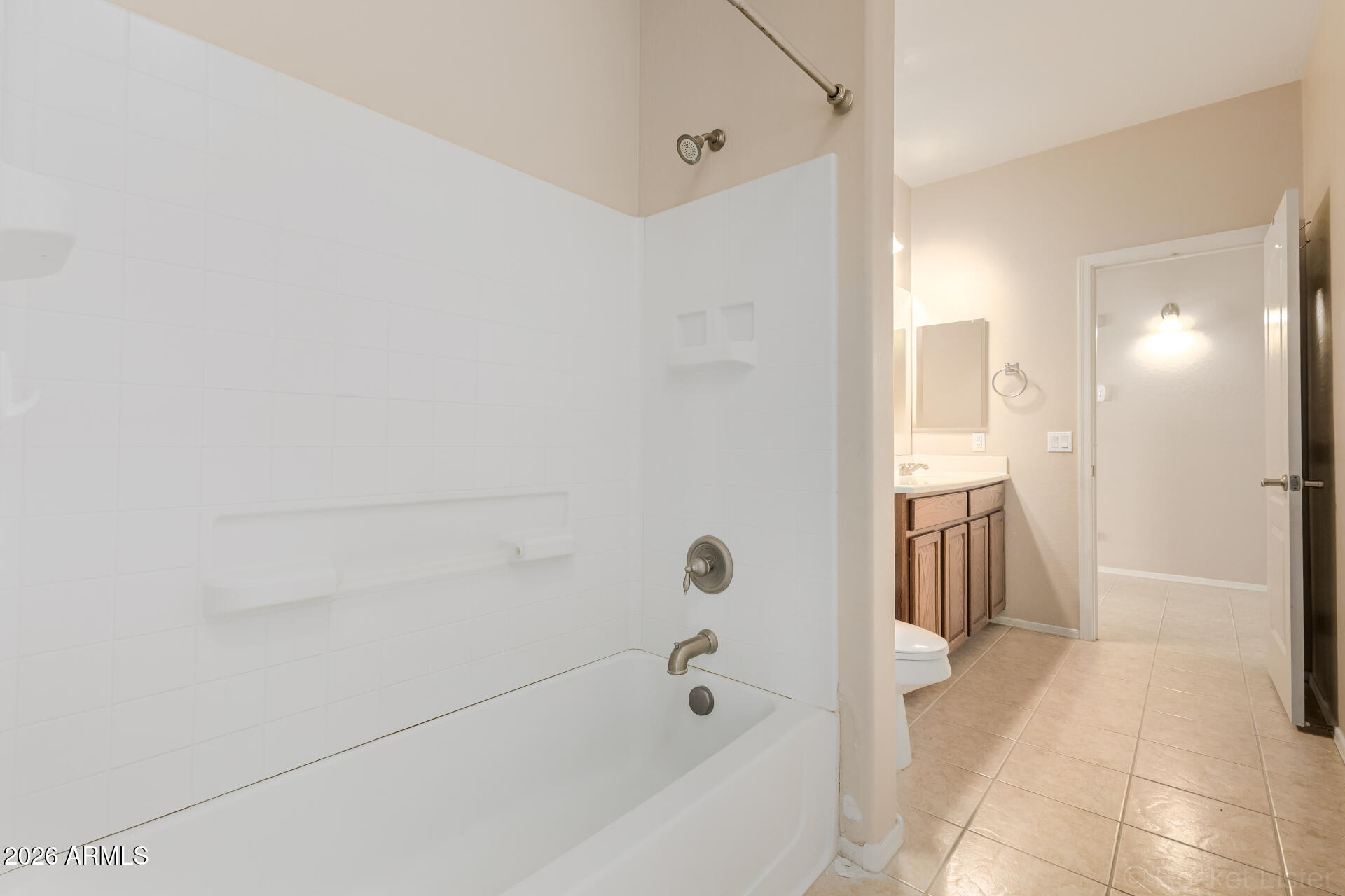 28314 North Crimm Road San Tan Valley, AZ 85143 - Photo 22 of 31 a bathroom with a bathtub and a shower