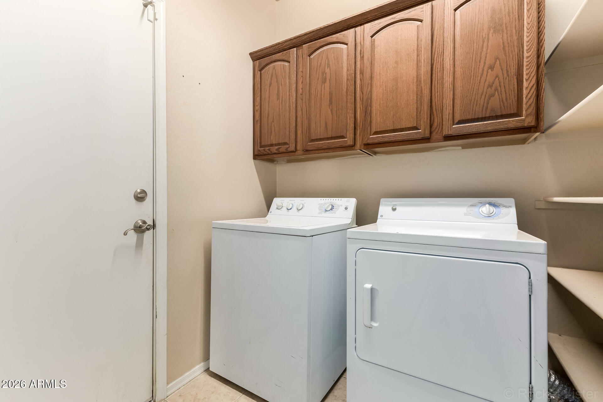 28314 North Crimm Road San Tan Valley, AZ 85143 - Photo 26 of 31 a utility room with dryer and washer