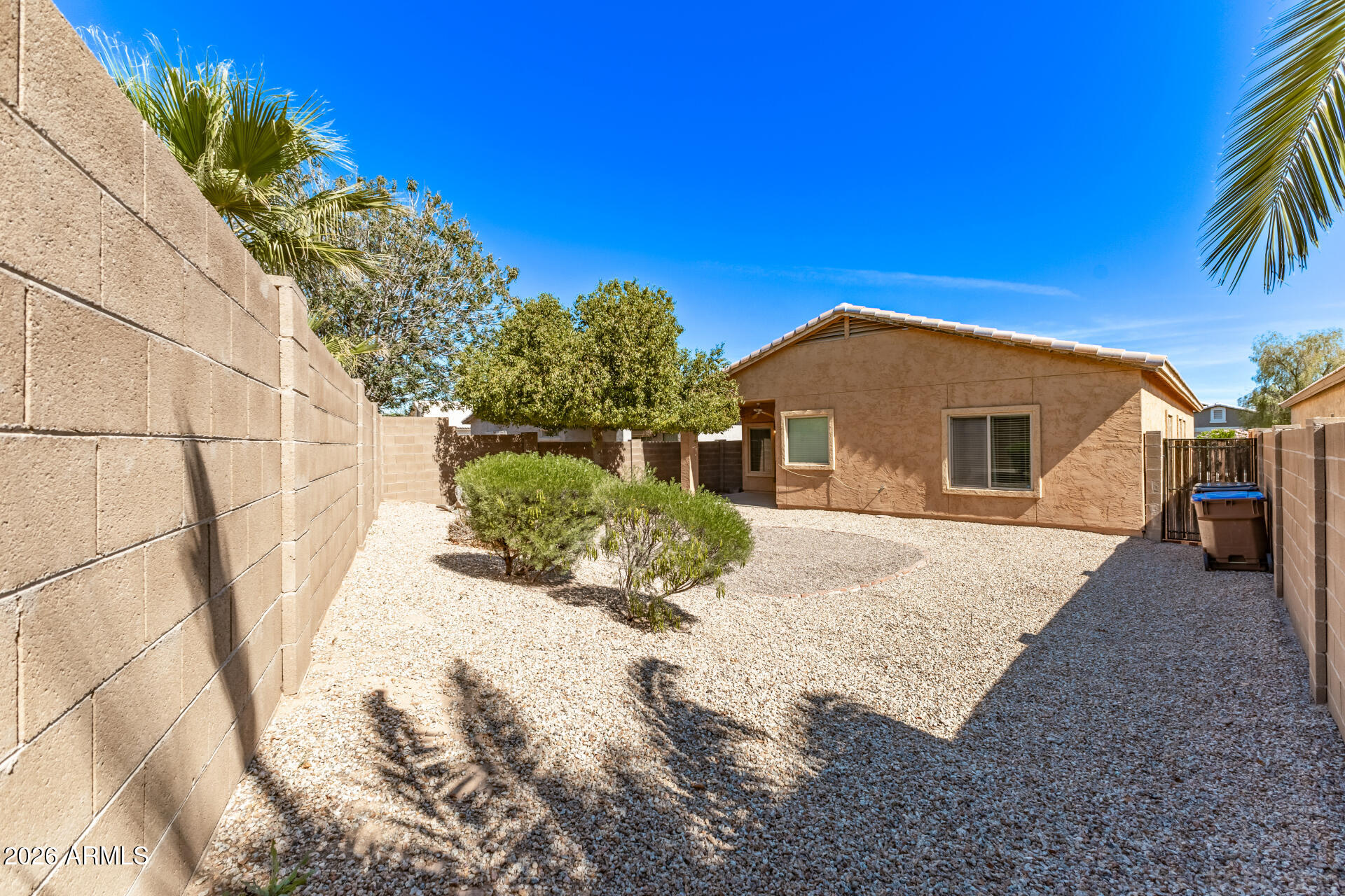 28314 North Crimm Road San Tan Valley, AZ 85143 - Photo 28 of 31 a front view of a house with a yard