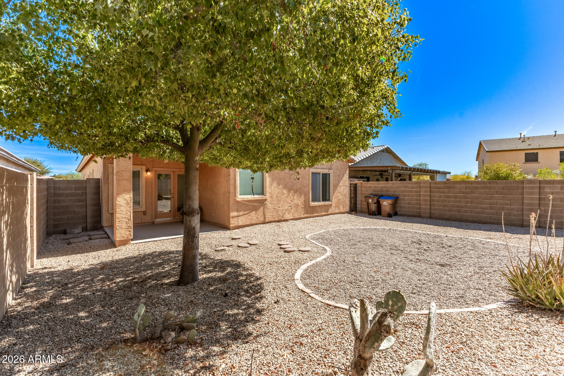 28314 North Crimm Road San Tan Valley, AZ 85143 - Photo 30 of 31 a front view of a house with a yard