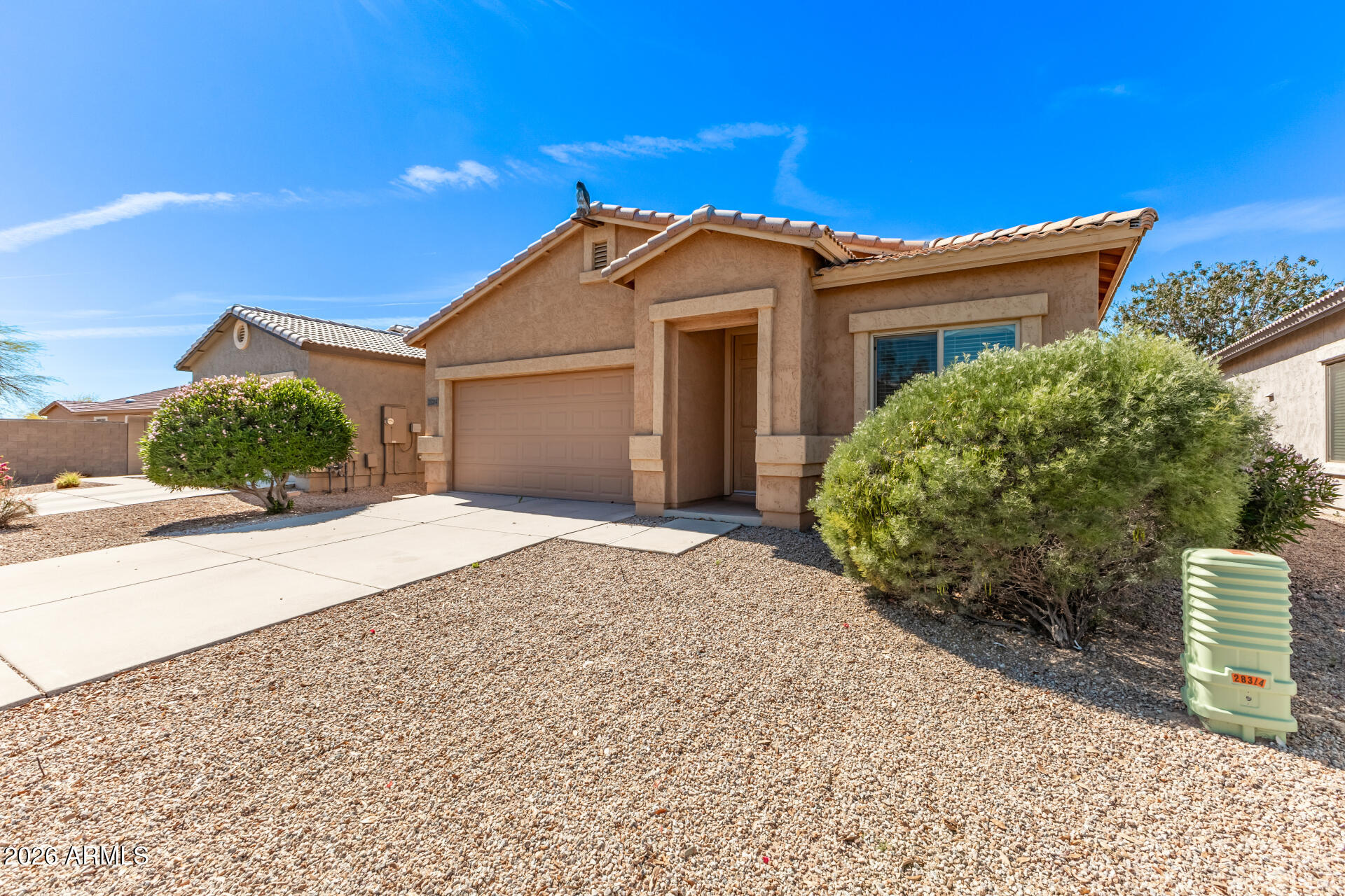 28314 North Crimm Road San Tan Valley, AZ 85143 - Photo 4 of 31 a view of a house with a yard and potted plants