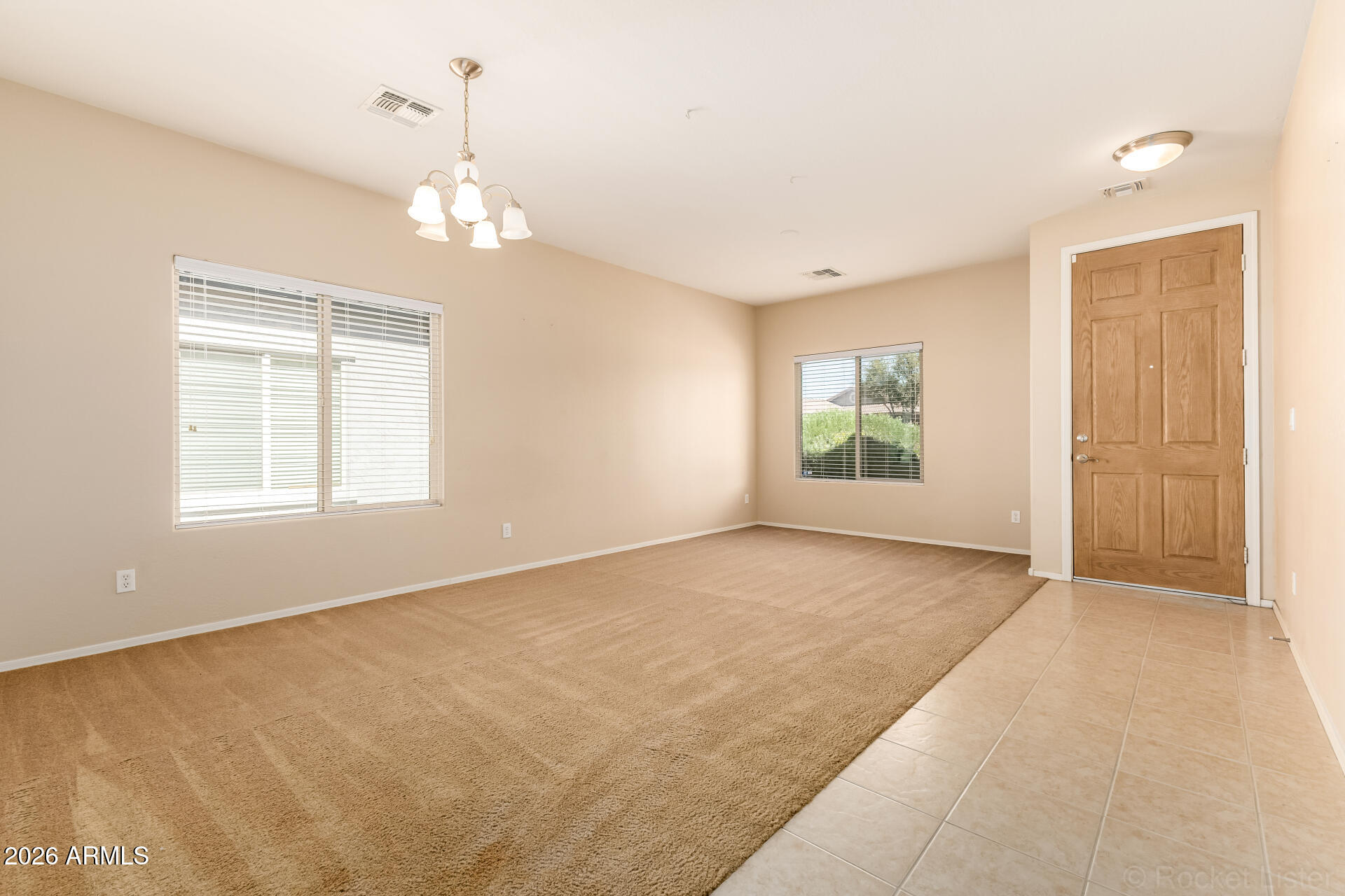 28314 North Crimm Road San Tan Valley, AZ 85143 - Photo 6 of 31 a view of an empty room with a window