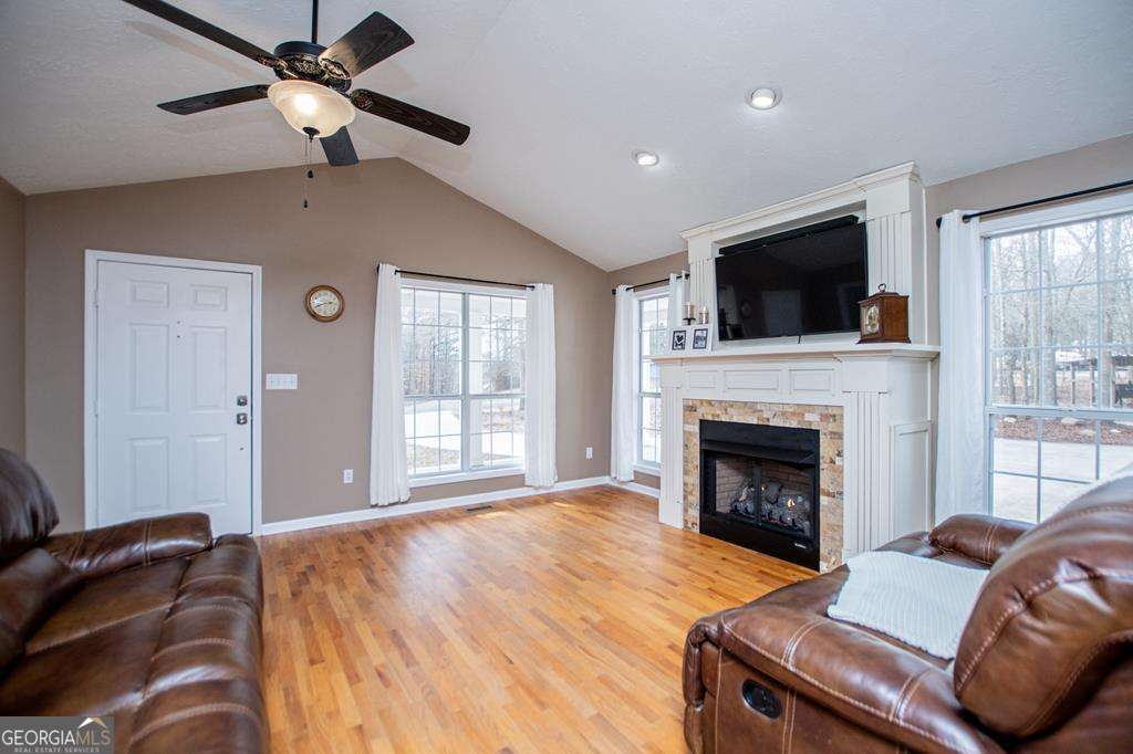 2 Pine Hill Drive Ranburne, AL 36273 - Photo 19 of 91 a bedroom with a bed and a fireplace