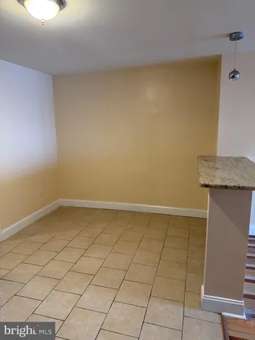 a view of a room with an empty space