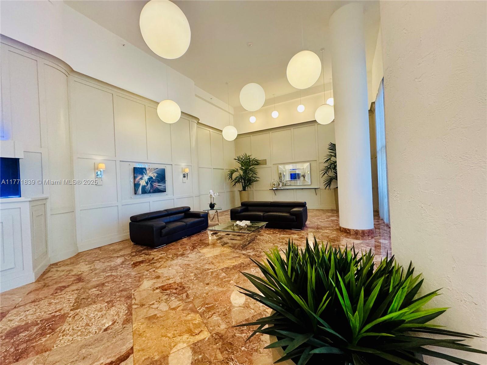 3600 Mystic Pointe Drive, Unit 1210 Aventura, FL 33180 - Photo 35 of 68 a living room with furniture