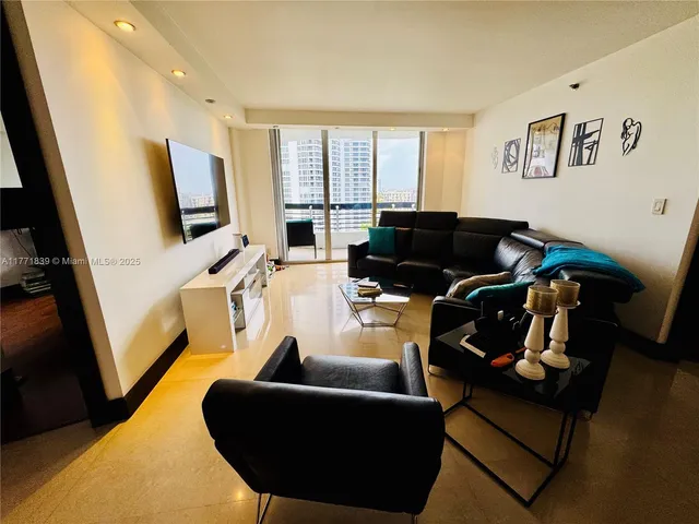 a table room with furniture and wooden floor