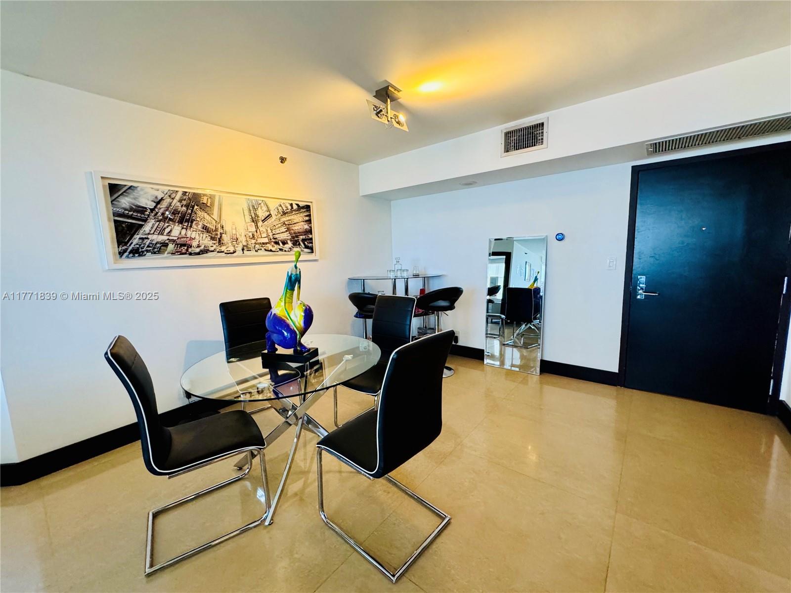 3600 Mystic Pointe Drive, Unit 1210 Aventura, FL 33180 - Photo 9 of 68 a living room with furniture and a fireplace