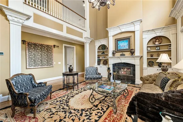 a kitchen with lots of counter top space and stainless steel appliances