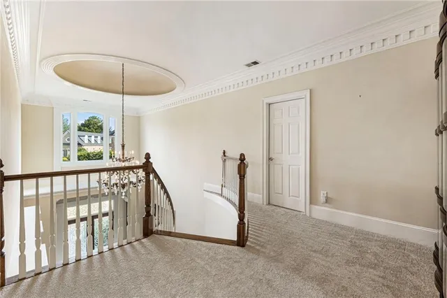 a kitchen with stainless steel appliances granite countertop a stove and a refrigerator