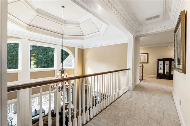 a kitchen with granite countertop a sink stainless steel appliances and cabinets