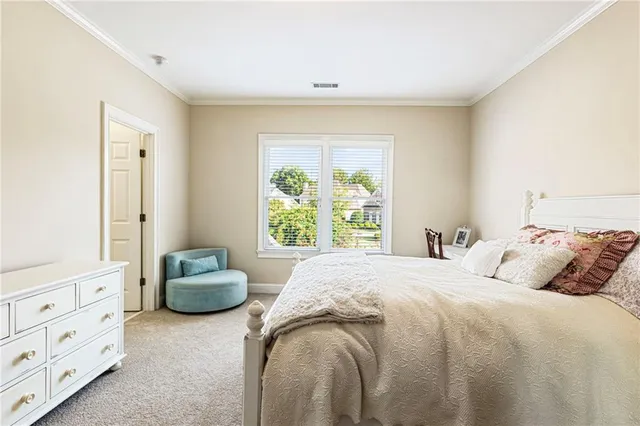 a living room with furniture fireplace and window