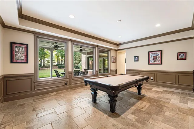 an aerial view of multiple houses with yard