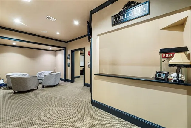 an aerial view of residential houses with outdoor space and street view