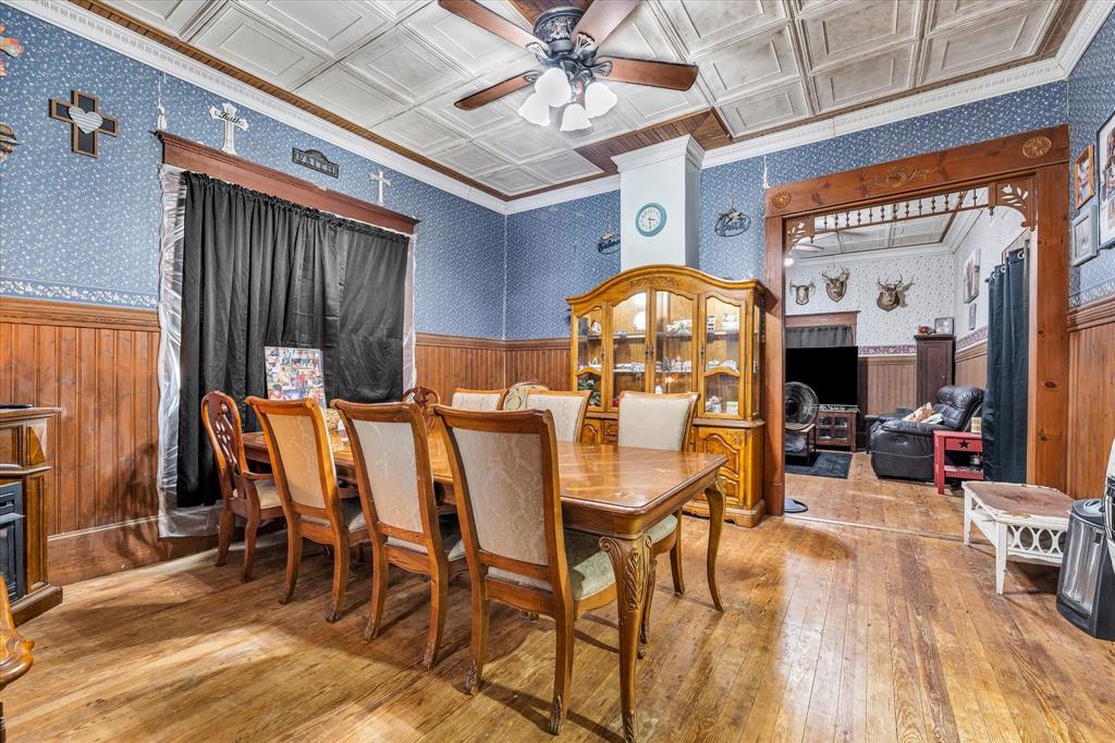 421 Huey Avenue Mount Calm, TX 76673 - Photo 12 of 39 a view of a dining room with furniture and chandelier