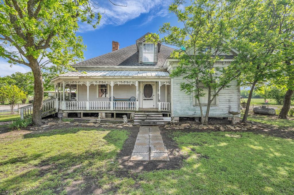 421 Huey Avenue Mount Calm, TX 76673 - Photo 2 of 39 front view of a house with a yard