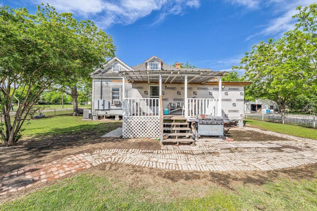 421 Huey Avenue Mount Calm, TX 76673 - Photo 29 of 39 a view of a house with a yard