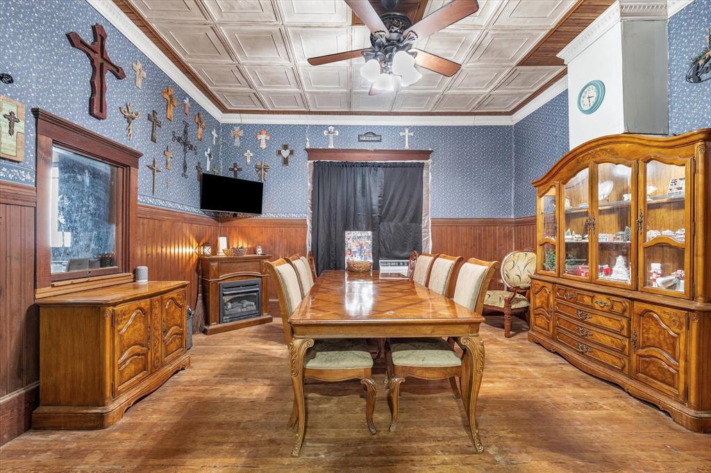 421 Huey Avenue Mount Calm, TX 76673 - Photo 9 of 39 a view of a dining room with furniture window and wooden floor