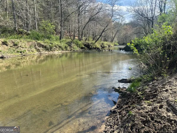 a view of a lake with outdoor space