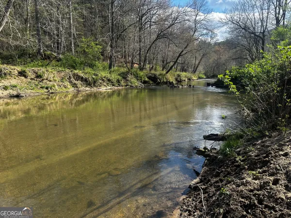 a view of a lake with outdoor space