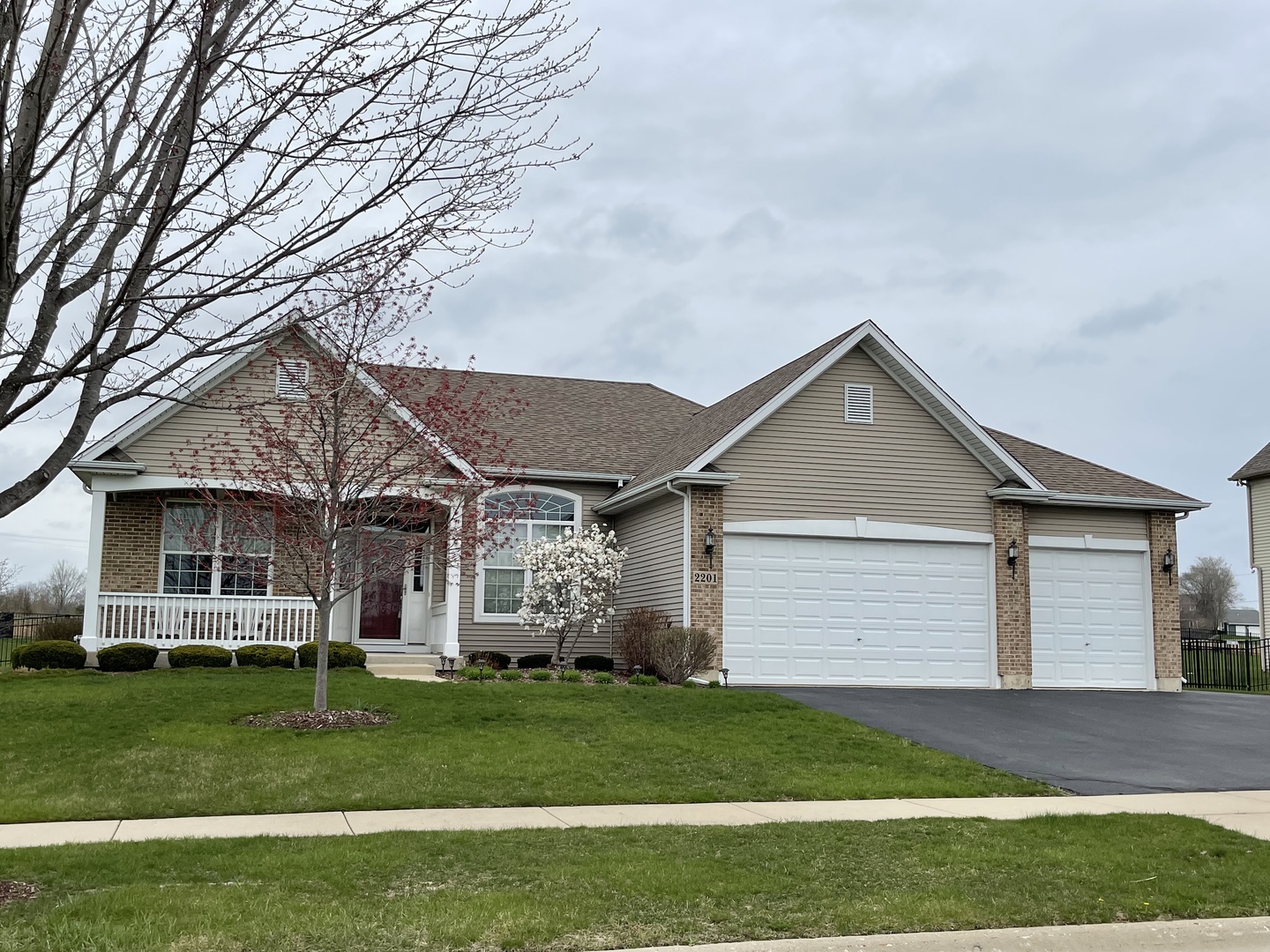 2201 Tyler Trail McHenry, IL 60051 - Photo 1 of 3 front view of a house with a yard